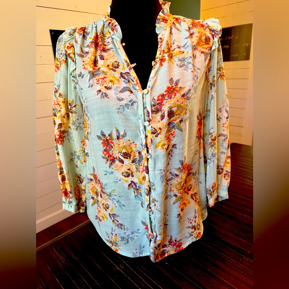Light green blouse.